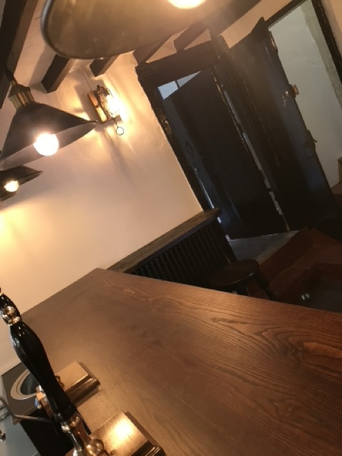 Micro pub bar area with pendant lighting