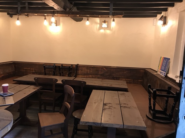 Micro pub seating area with ladder light feature