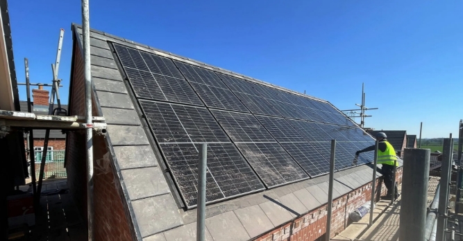 Solar panel installation on a tiled roof
