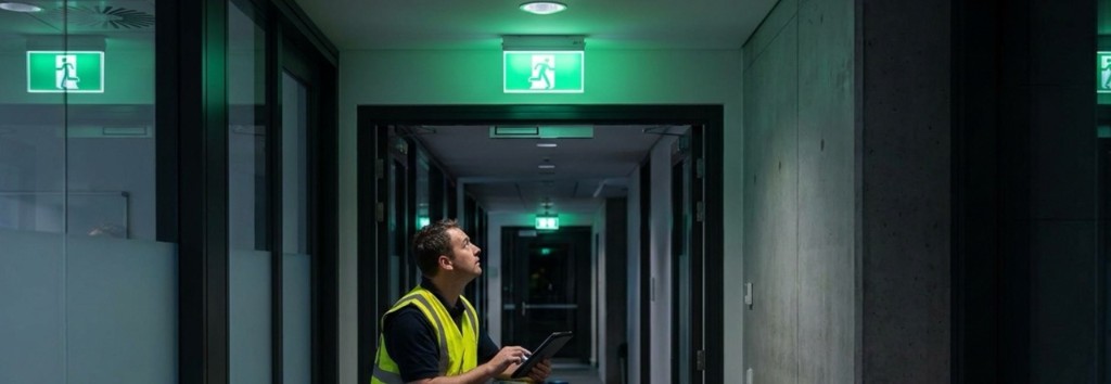Emergency lighting inspection in a commercial corridor