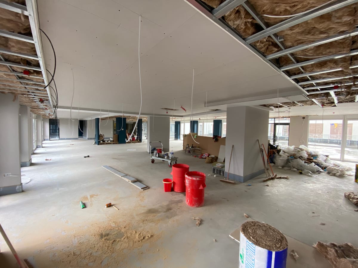 Communal circulation area with feature ceiling lighting