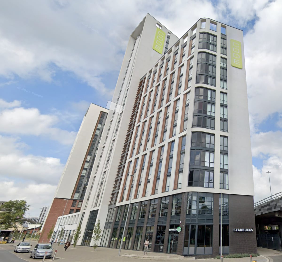 CODE Fairfax student accommodation tower with vertical CODE branding