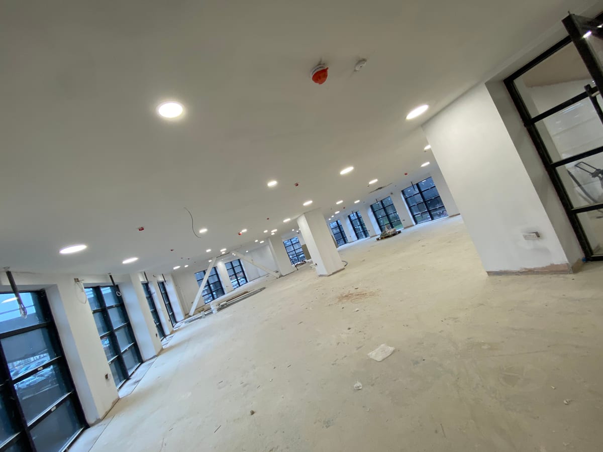 Gym space with recessed LED lighting during fit-out