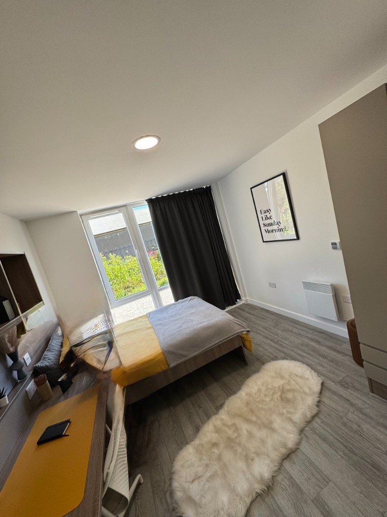 Student flat interior with heating and lighting controls