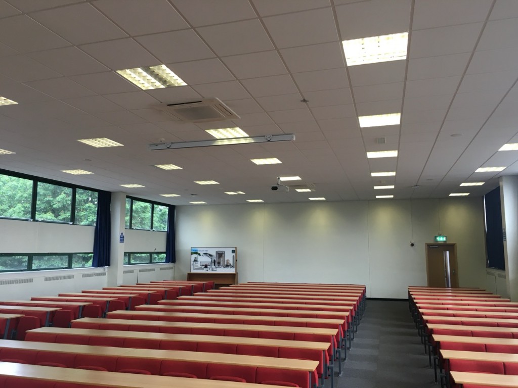 Tiered lecture theatre with LED ceiling lighting at the College of Policing