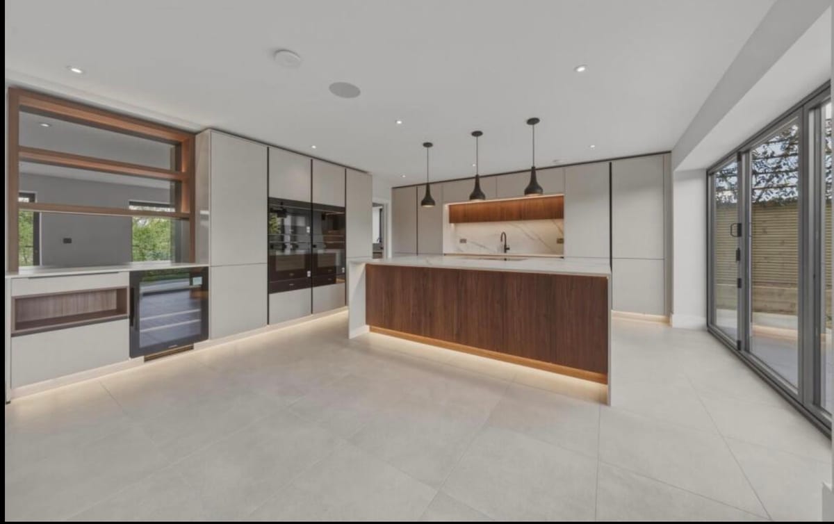 Luxury bathroom with walk-in shower and feature lighting