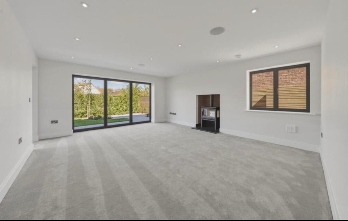 Bedroom with built-in wardrobe and recessed lighting