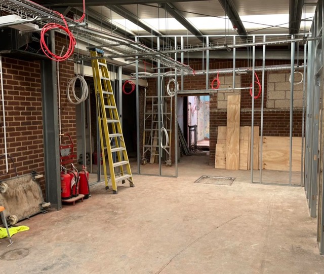 Wall-mounted electrical cabinet in utility room