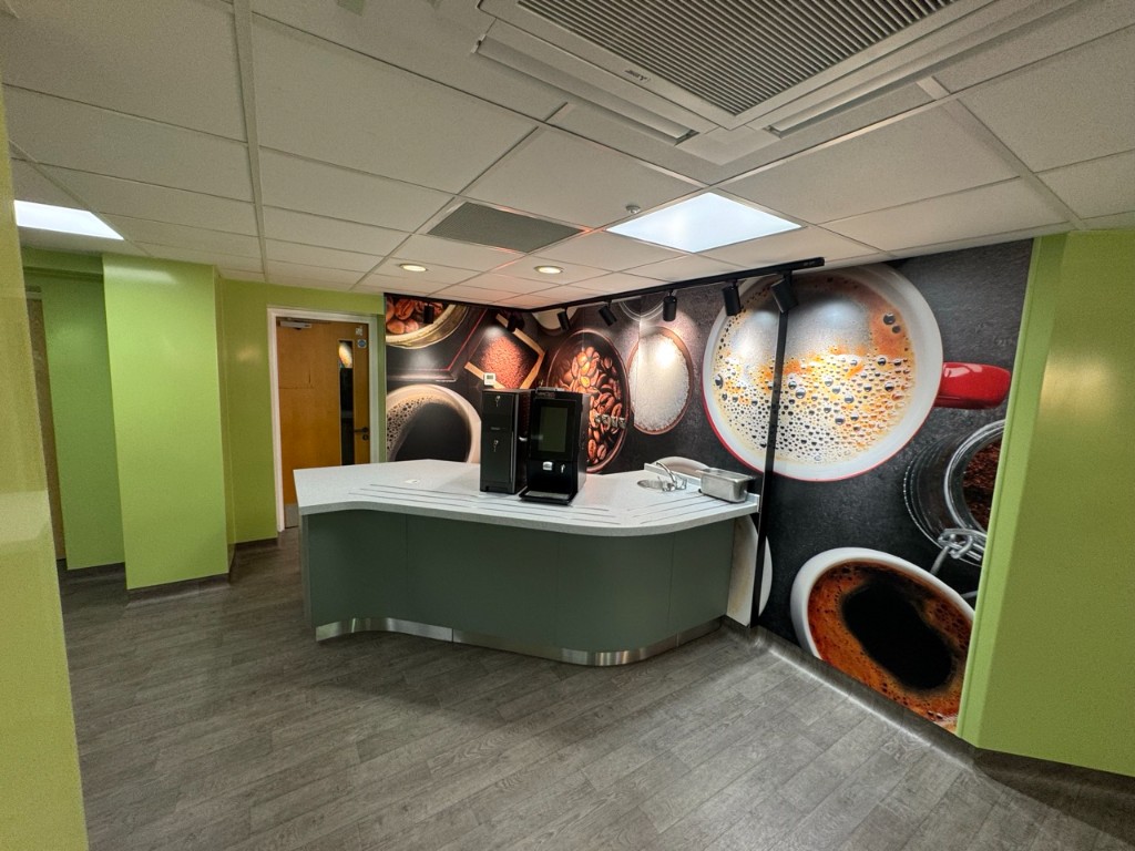 Curved coffee counter with integrated lighting