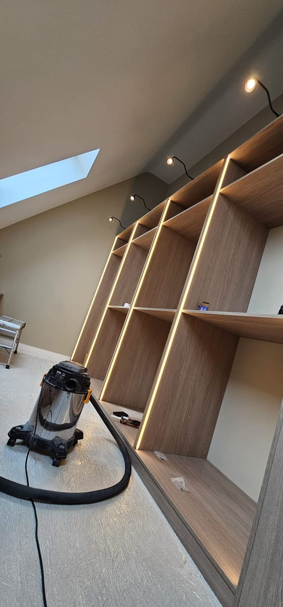 Study shelving with LED strips and adjustable display lighting
